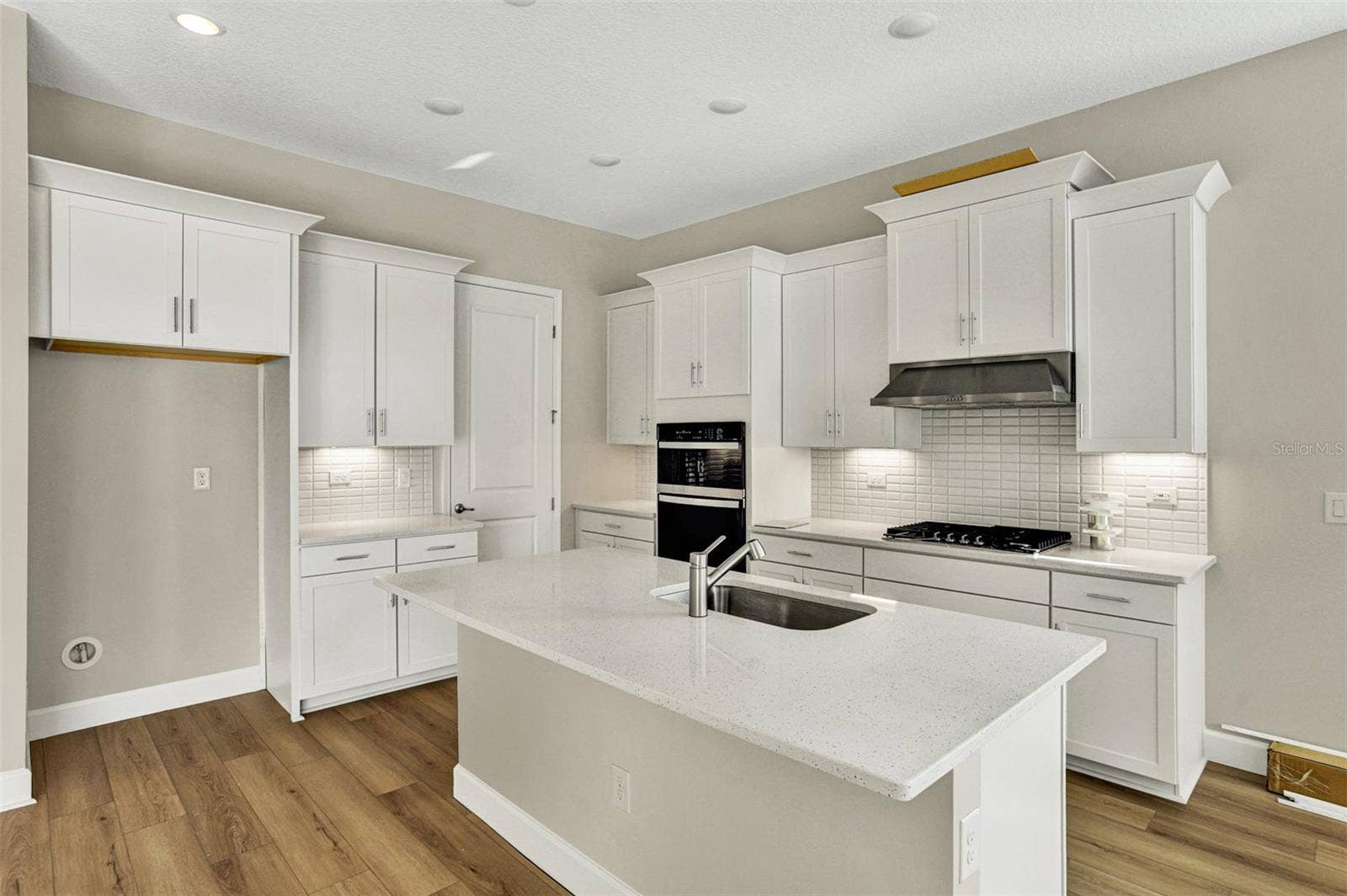 The sample photos included are of the model home and are meant to showcase the craftsmanship and design quality.