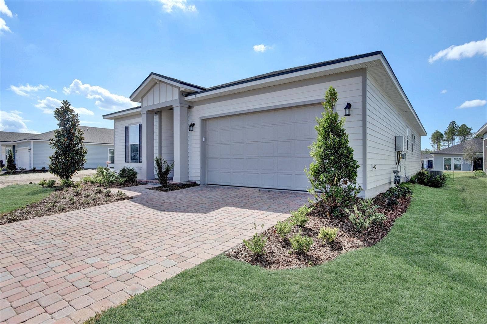 The sample photos included are of the model home and are meant to showcase the craftsmanship and design quality.