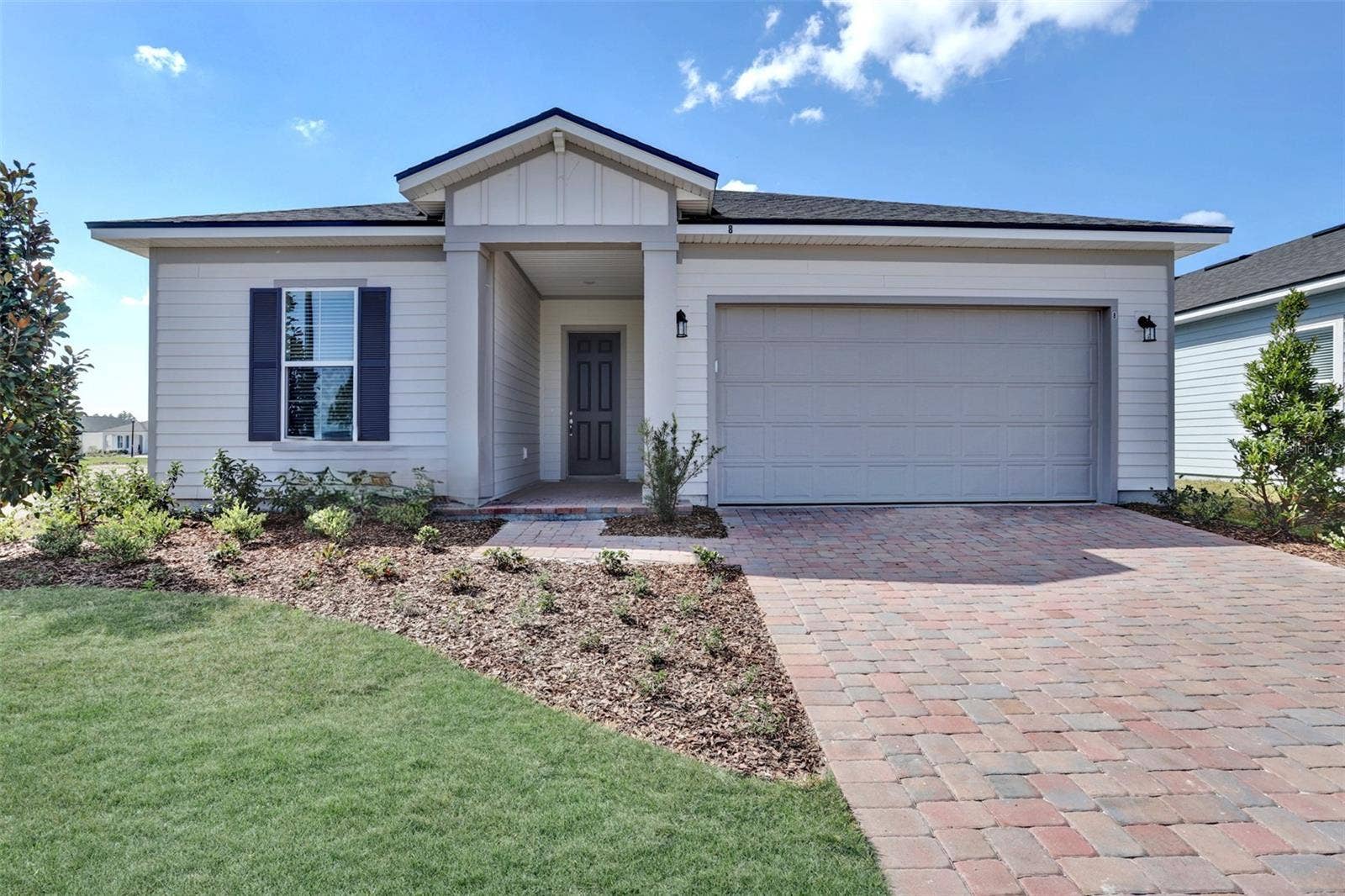 The sample photos included are of the model home and are meant to showcase the craftsmanship and design quality.