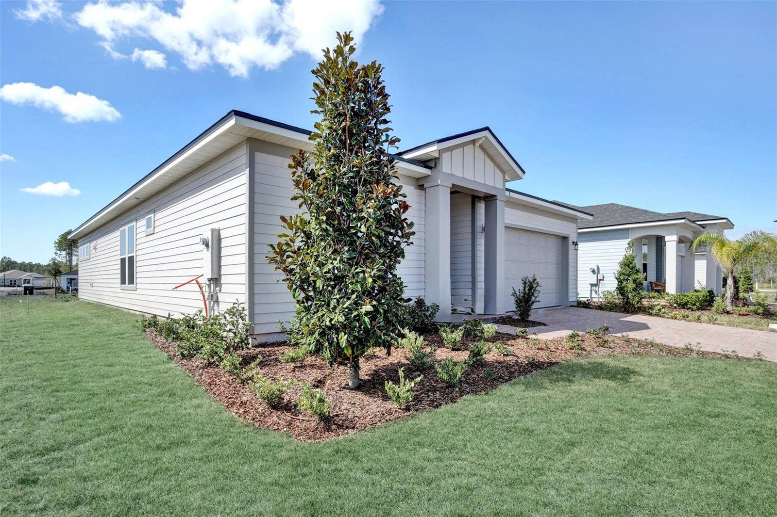 The sample photos included are of the model home and are meant to showcase the craftsmanship and design quality.