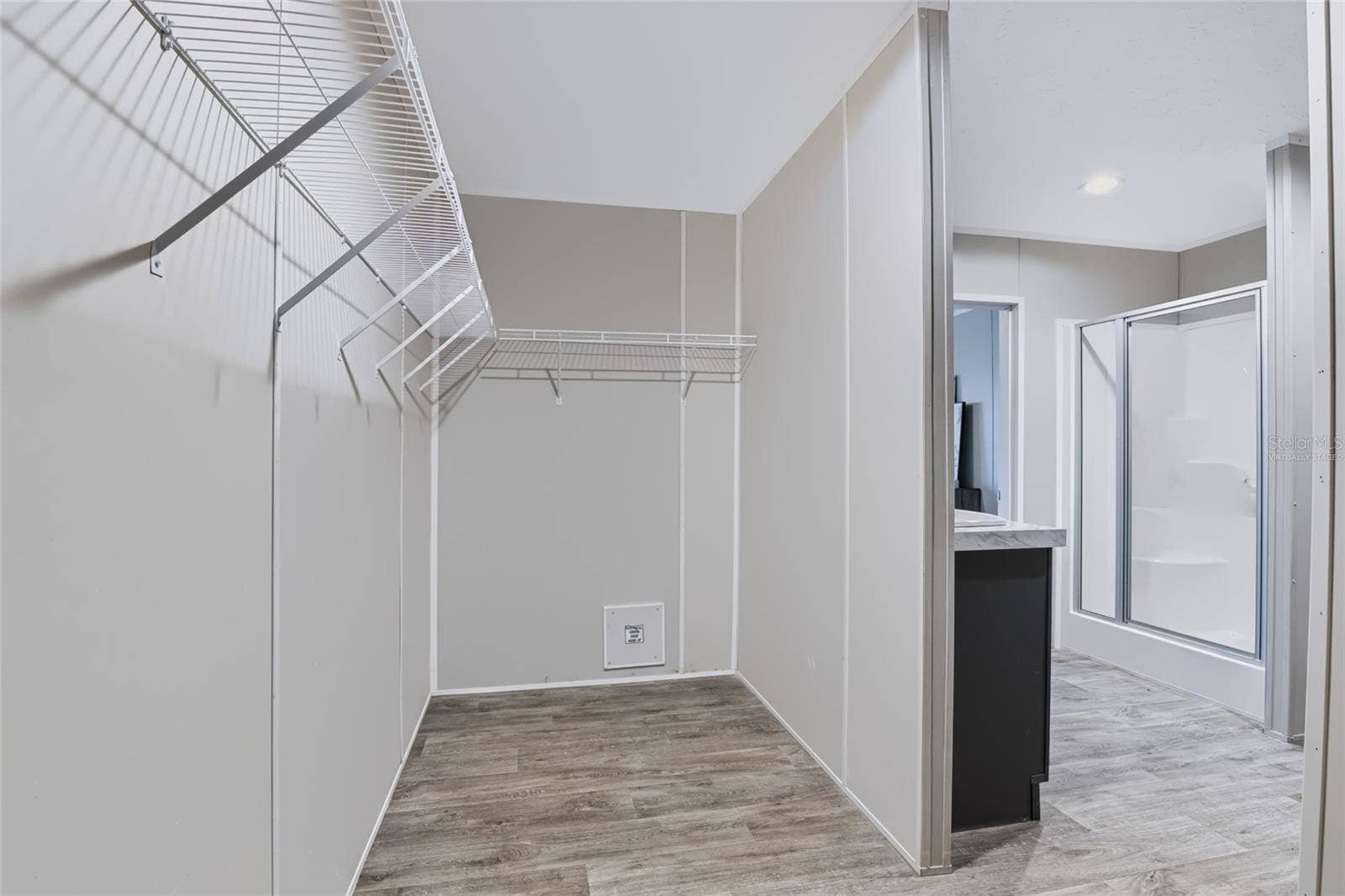 25124 HUCKLEBERRY WAY, Astatula, FL 34705 Primary closet