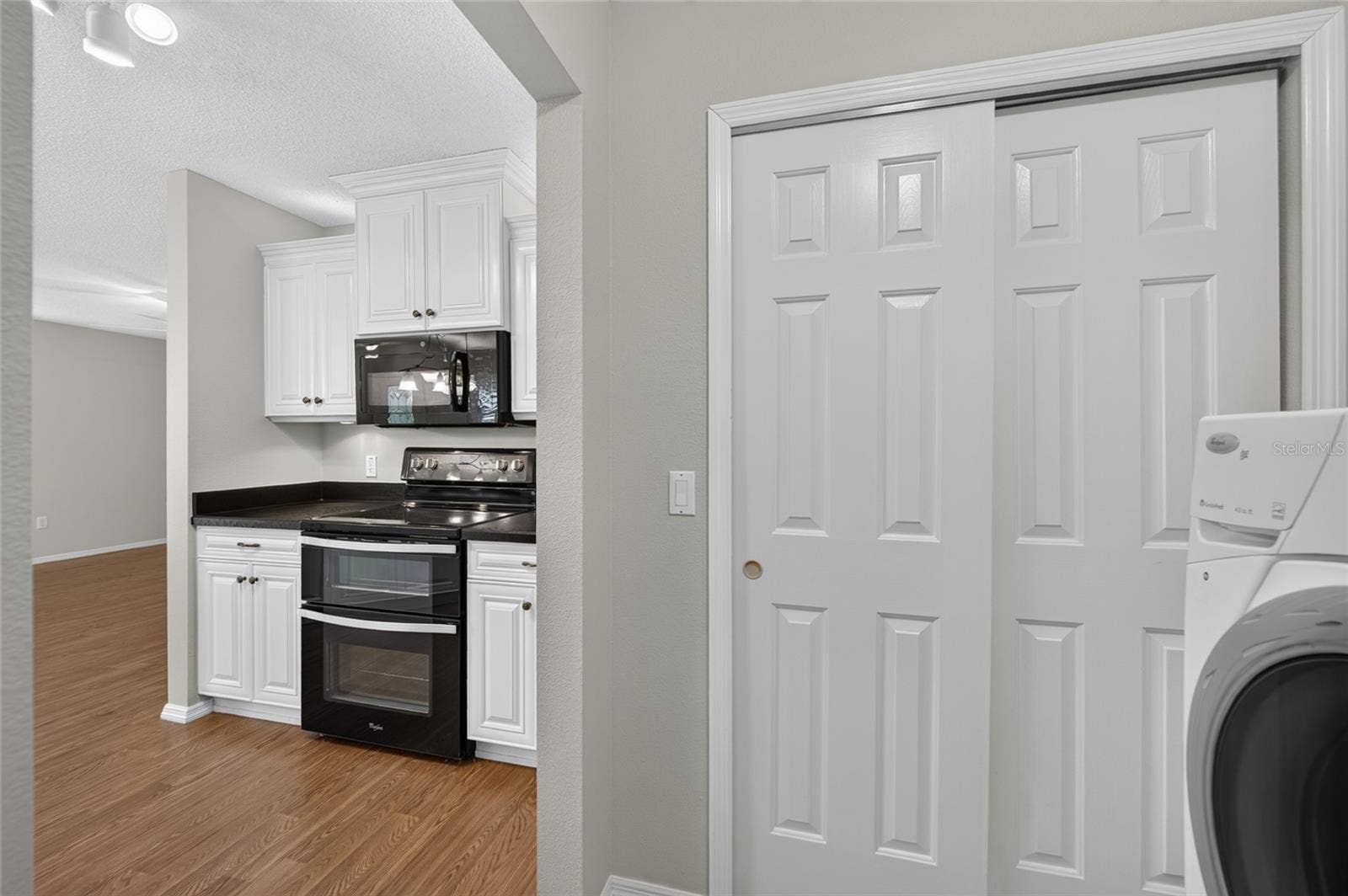 PANTRY &/or STORAGE - Double-door pantry/storage closet is conveniently located near the kitchen.