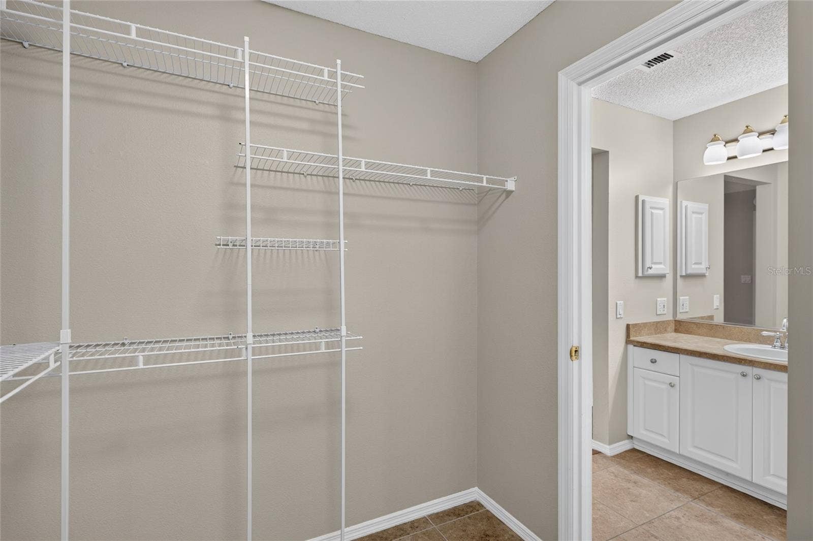 Another view of the interior of the WALK-IN CLOSET