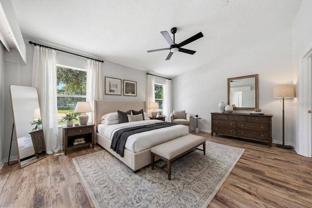 24809 RIVERBOAT BEND, Leesburg, FL 34748 Primary Bedroom with tall ceilings - Staged