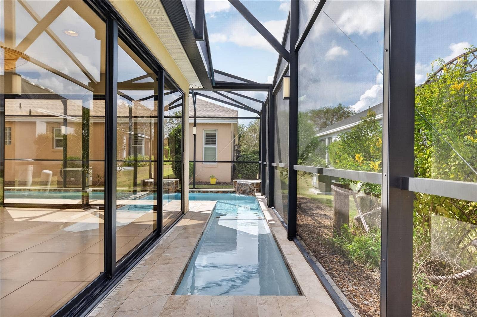 2077 VICKERS PLACE, The Villages, FL 32163 ENTERANCE TO LAP POOL