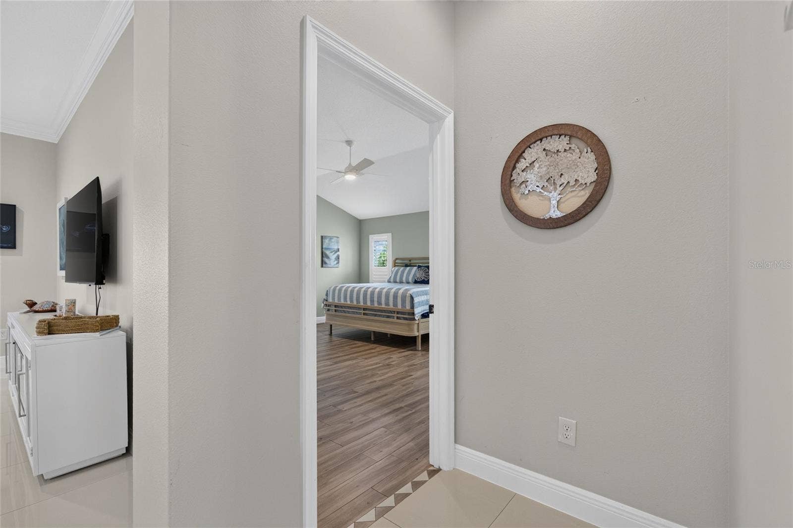 2077 VICKERS PLACE, The Villages, FL 32163 PRIMARY BEDROOM OFF THE LIVING ROOM