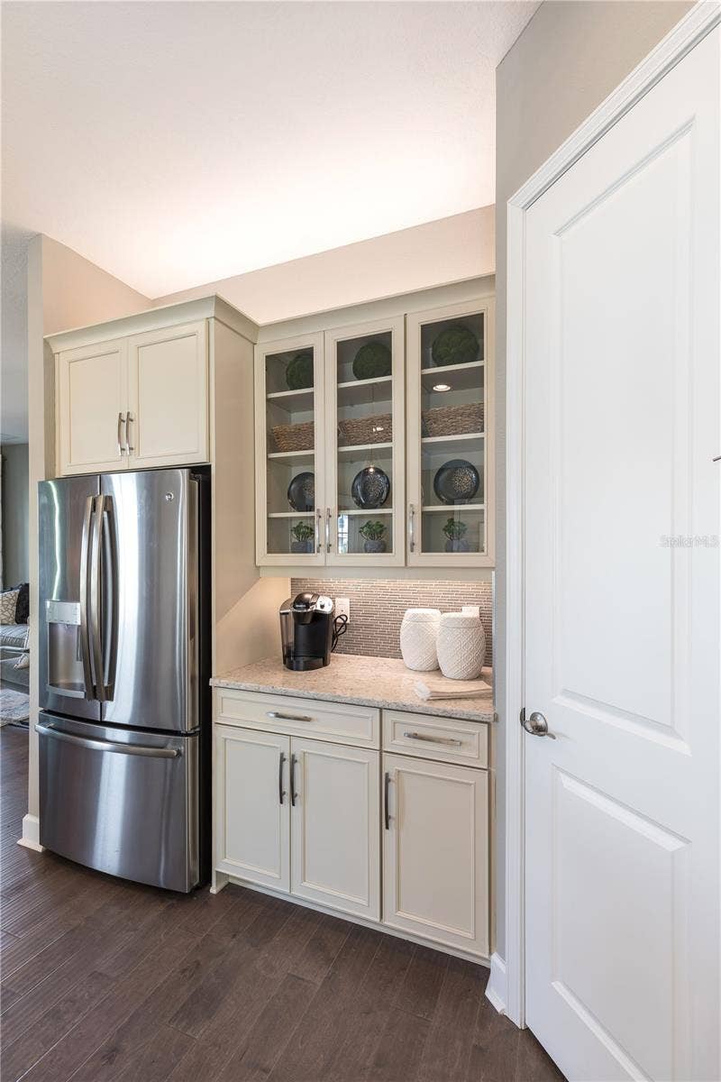 The sample photos included are of the model home and are meant to showcase the craftsmanship and design quality.