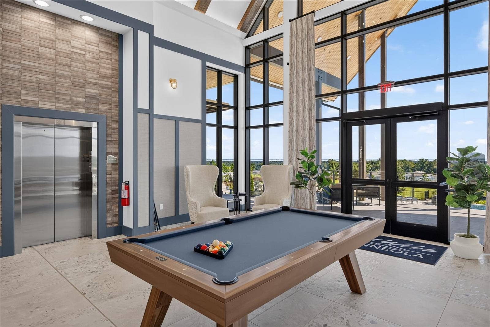 Enjoy a Game of Pool or Relax Outside Overlooking the Gorgeous Pool!