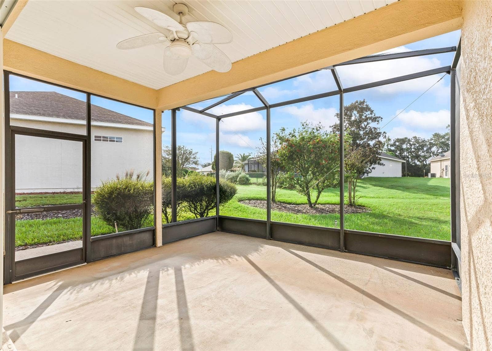 12439 SE 176TH LOOP, Summerfield, FL 34491 Covered and screened lanai faces South