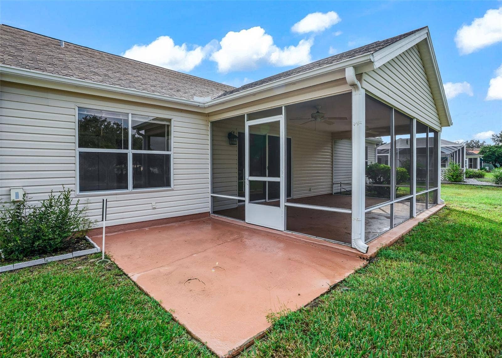 930 RAMOS DRIVE, The Villages, FL 32159 Screened Lanai and back patio