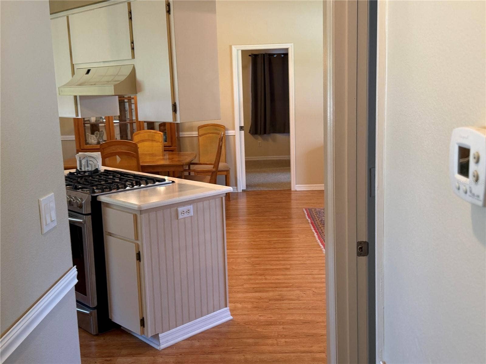 5641 LAVER STREET, Leesburg, FL 34748 Garage to Inside View