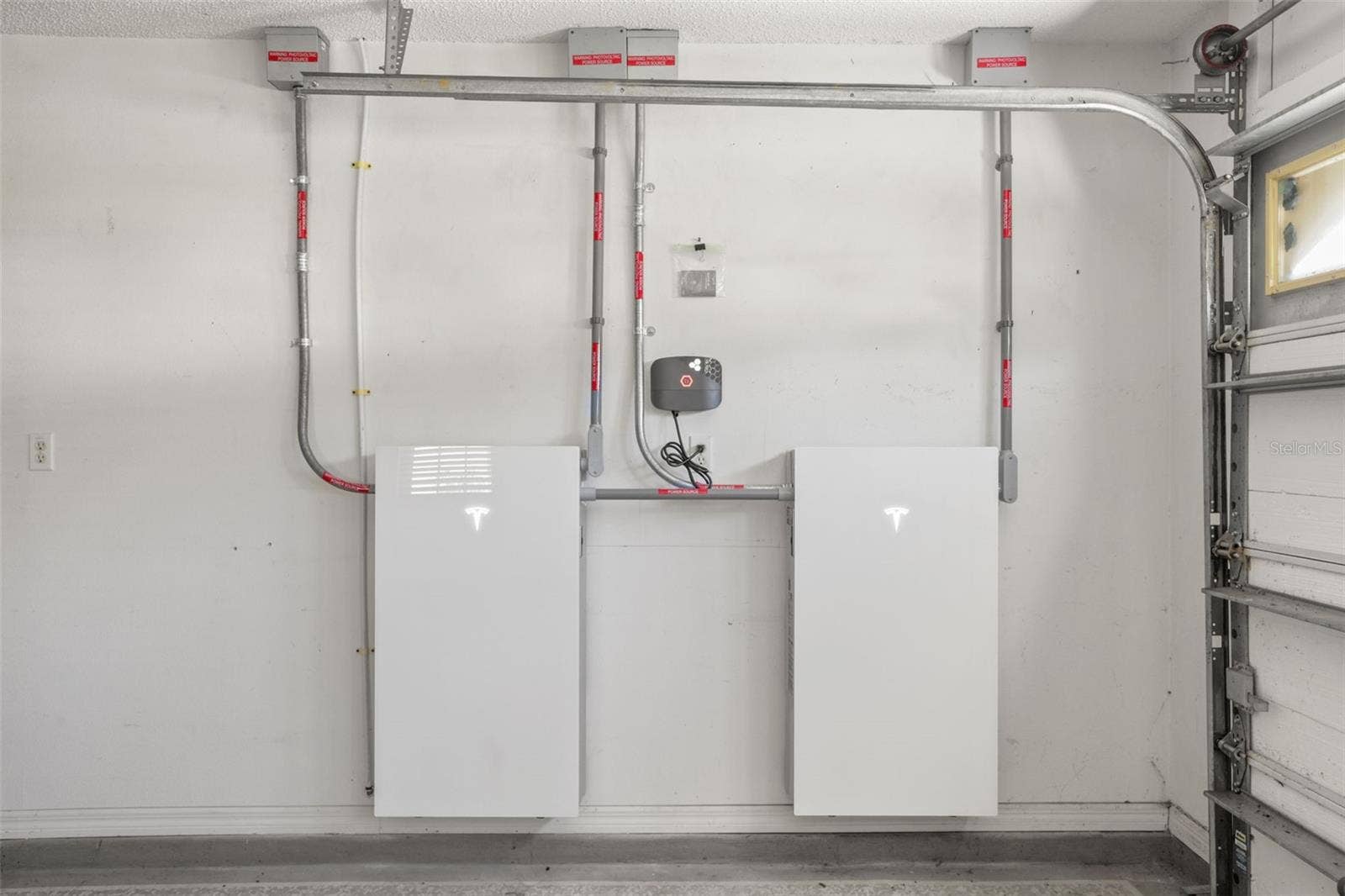 4704 RIVER RIDGE DRIVE, Leesburg, FL 34748 Tesla wall for solar battery storage