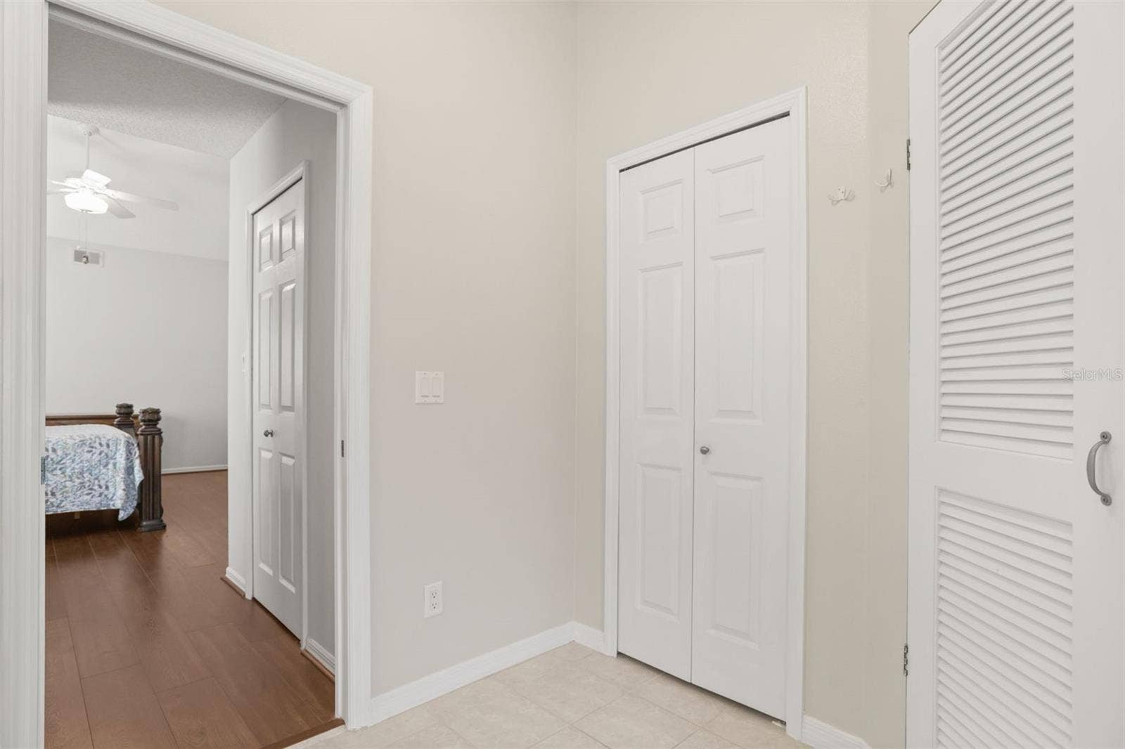 4704 RIVER RIDGE DRIVE, Leesburg, FL 34748 Primary ensuite storage and private louve