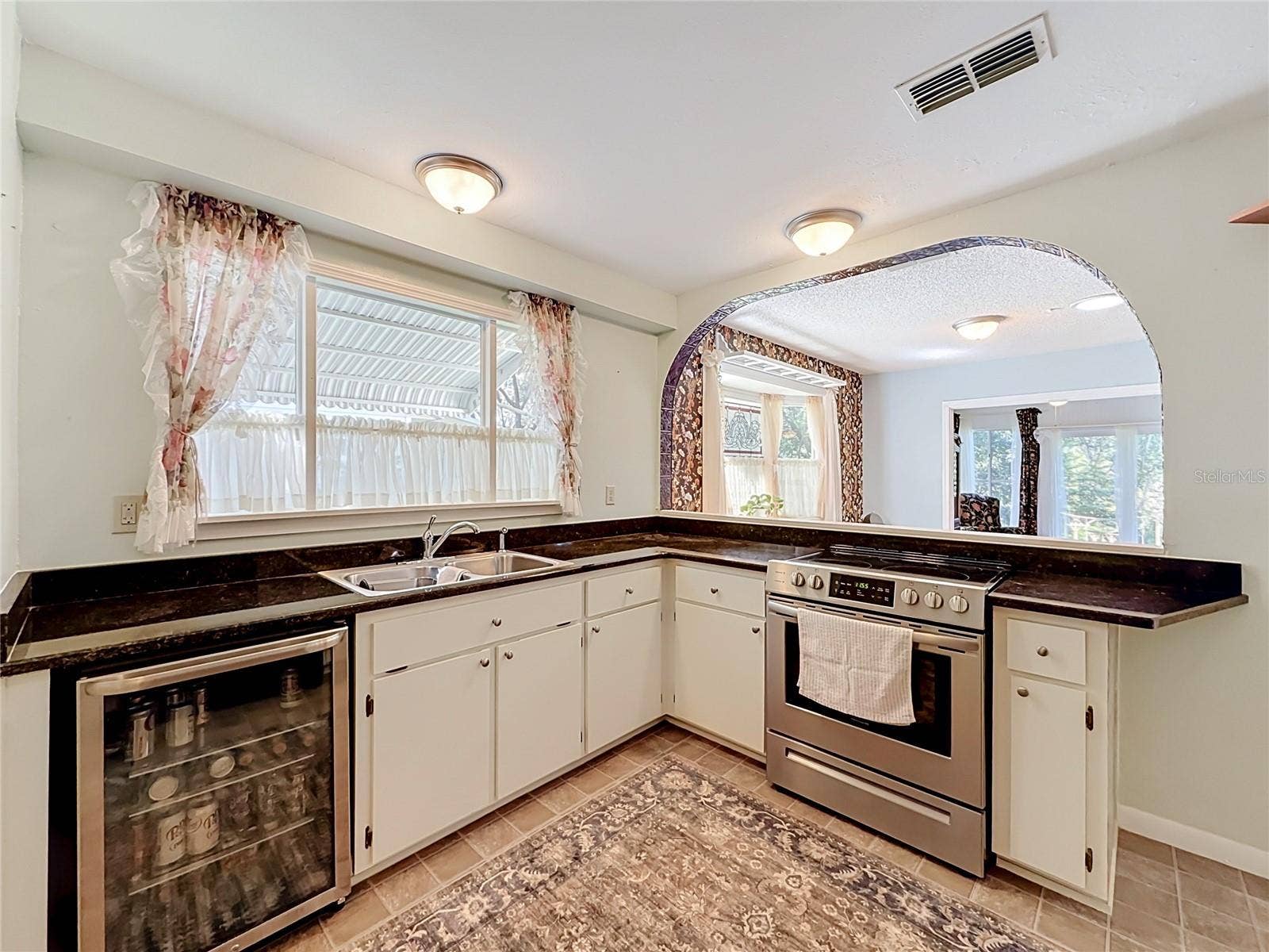 1706 ORKNEY DRIVE, Leesburg, FL 34788 Beverage fridge, the grandkids will love you!