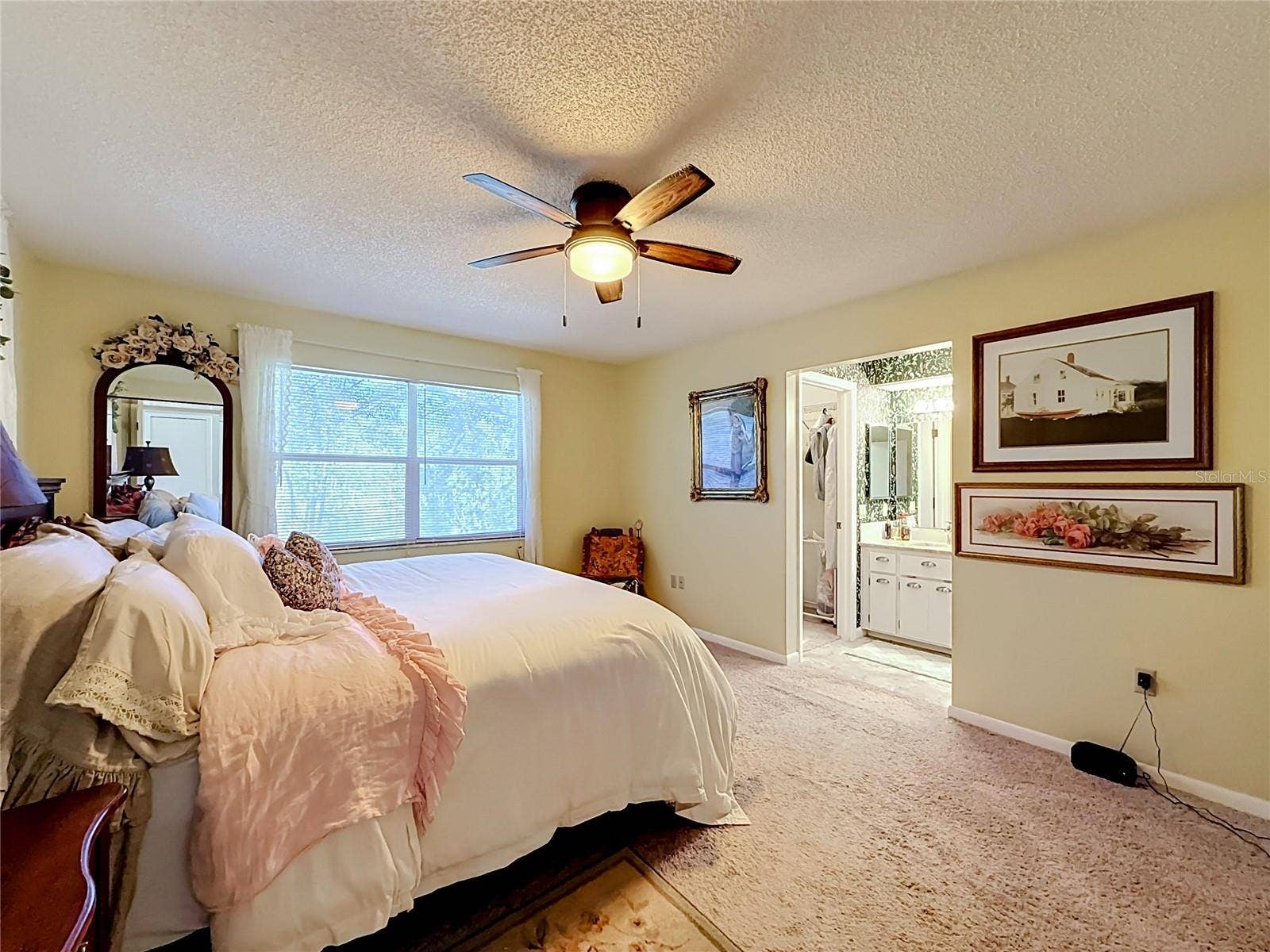 1706 ORKNEY DRIVE, Leesburg, FL 34788 Primary bedroom with en-suite bathroom