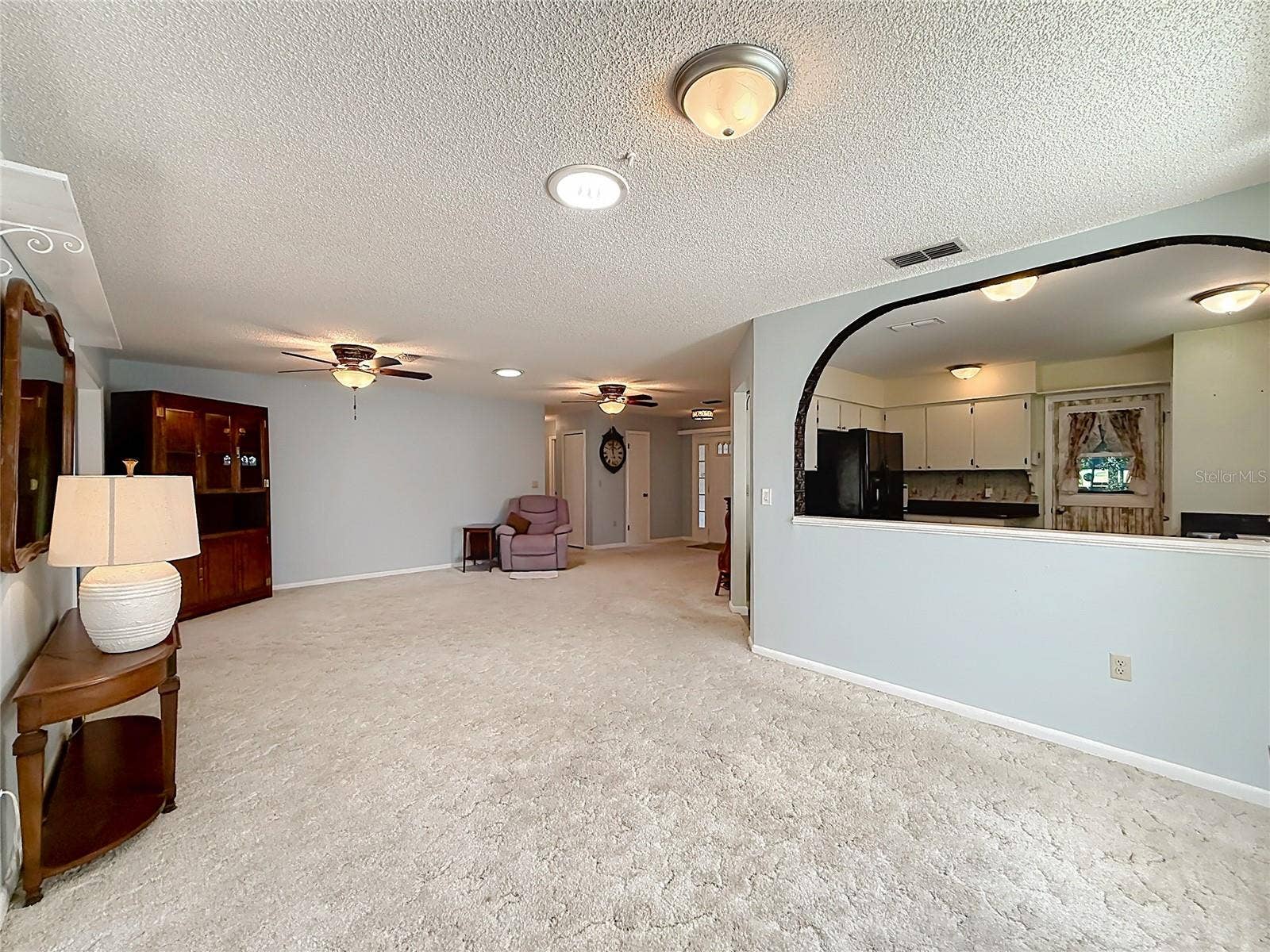1706 ORKNEY DRIVE, Leesburg, FL 34788 Dining room open to the kitchen