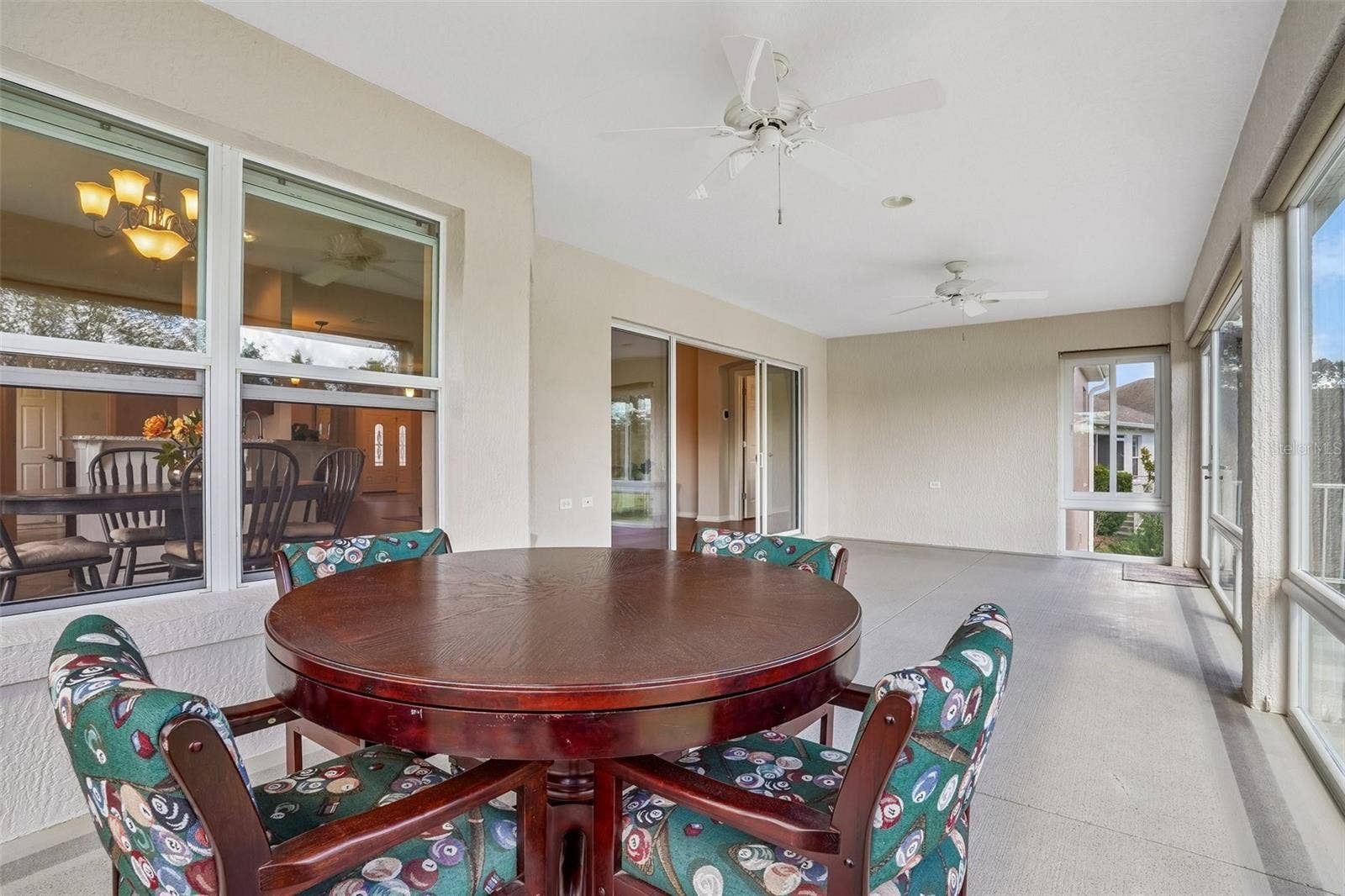 494 ARBELLA LOOP, The Villages, FL 32162 Enclosed Lanai with Water View