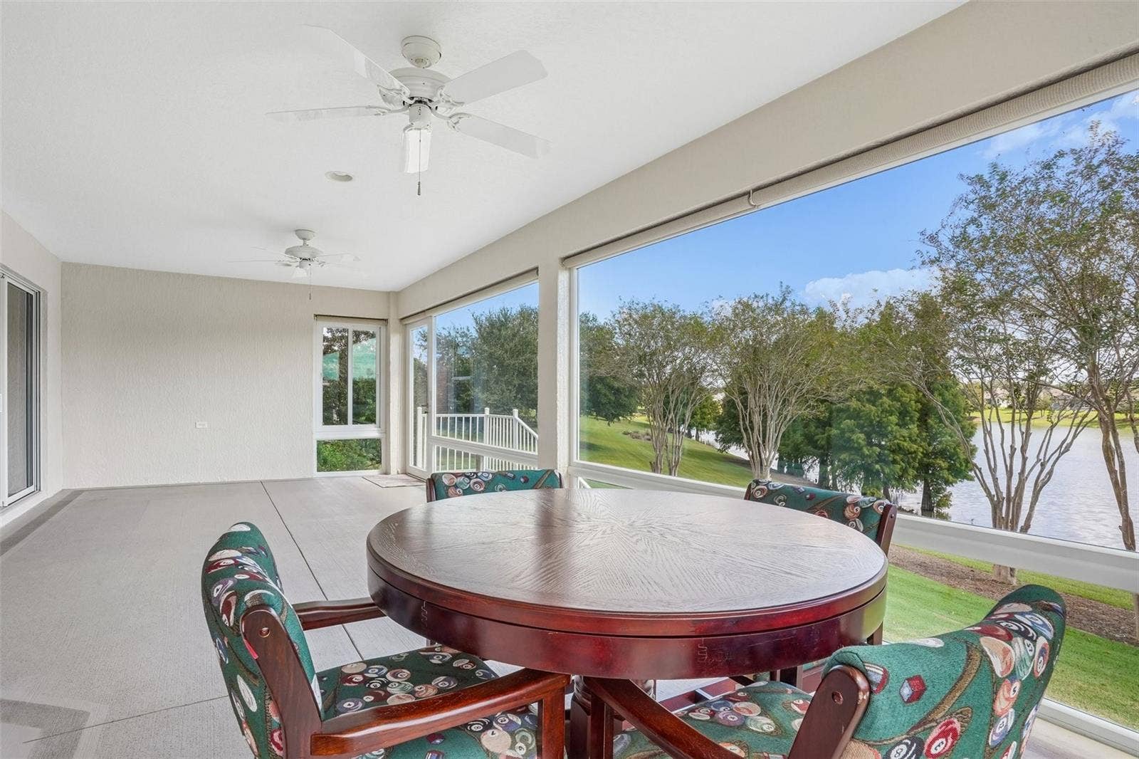 494 ARBELLA LOOP, The Villages, FL 32162 Enclosed Lanai with Water View