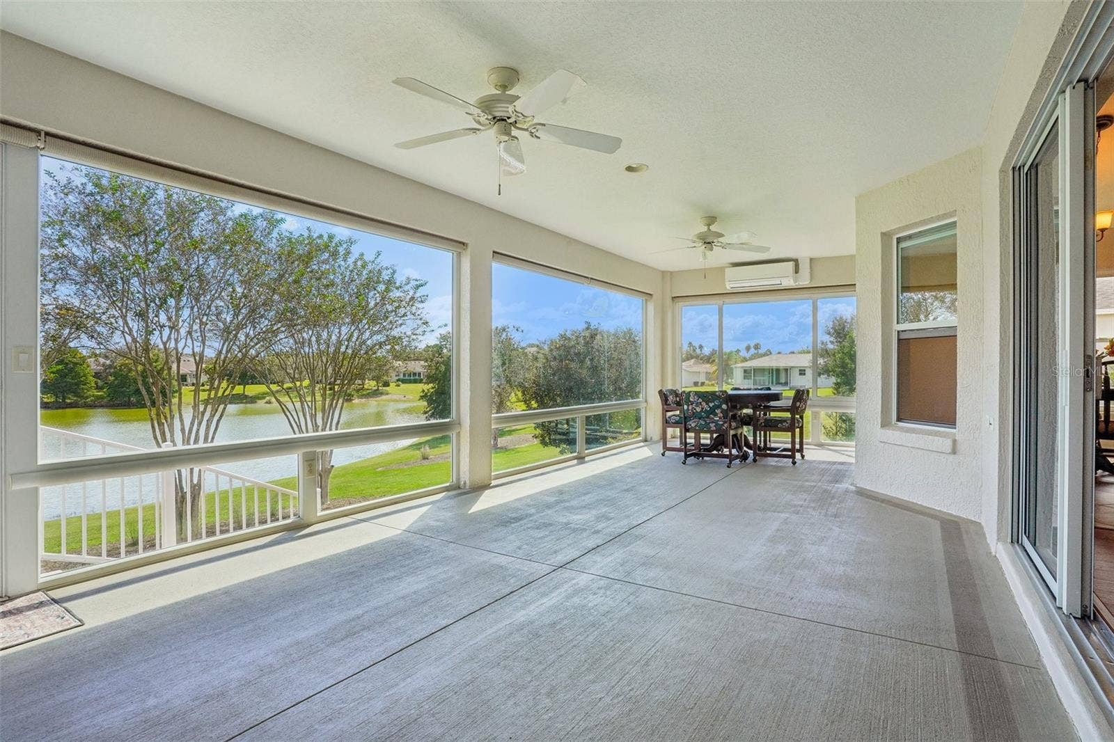 494 ARBELLA LOOP, The Villages, FL 32162 Enclosed Lanai with Water View