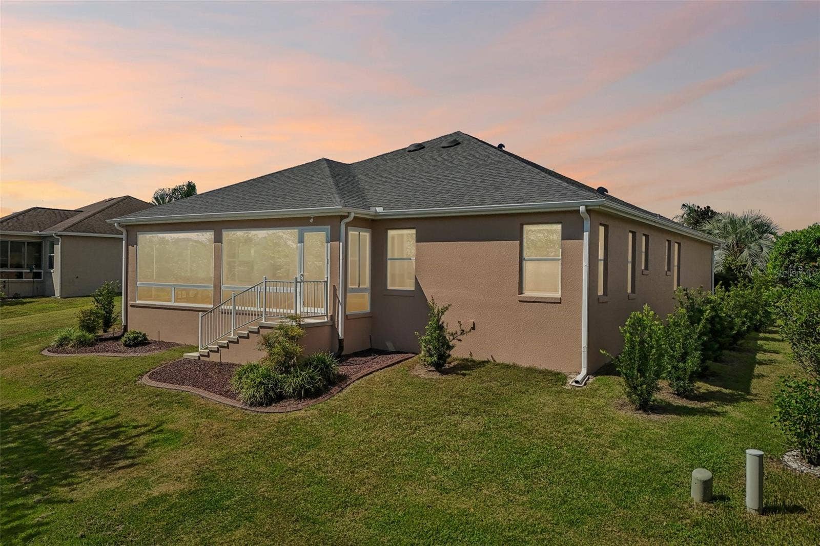 494 ARBELLA LOOP, The Villages, FL 32162 Twilight Rear Exterior