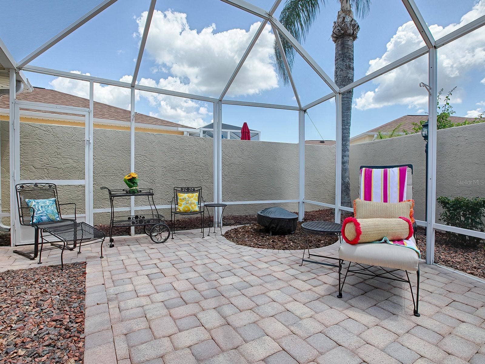 1129 SANTA CRUZ DRIVE, The Villages, FL 32162 Large Lanai (furniture shown for staging purposes only)
