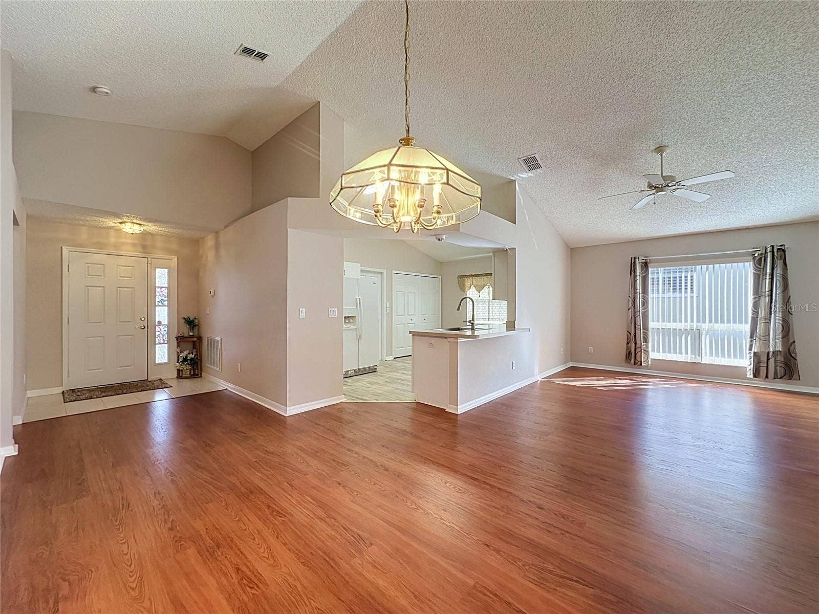 Foyer, Kitchen, Living & Dining Room