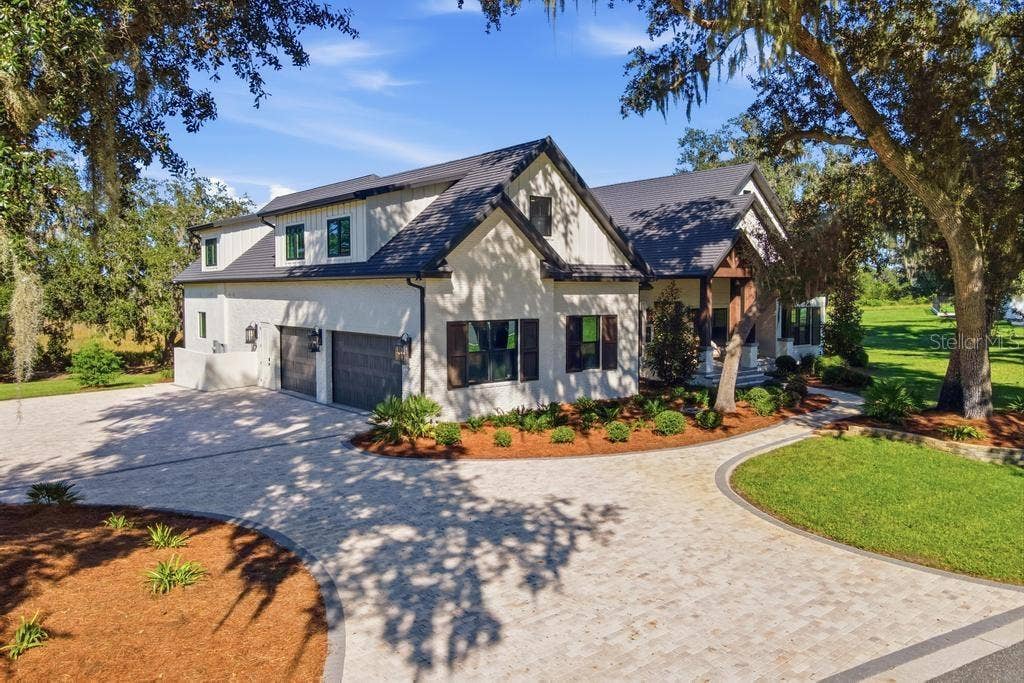 Great curb appeal with manicured lawn