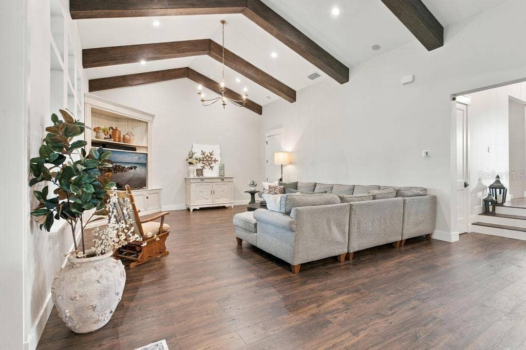Cathedral Ceilings with the wood beams.