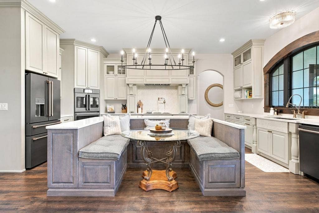 Floor to ceiling cabinets and love the lighting!