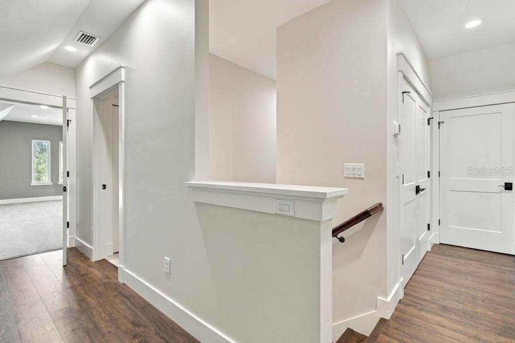 Upstairs hallway leads to bedrooms three and four, bonus family room, and "Flex space"