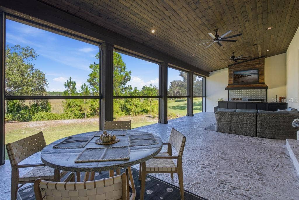 Back porch with view of the lake and nature