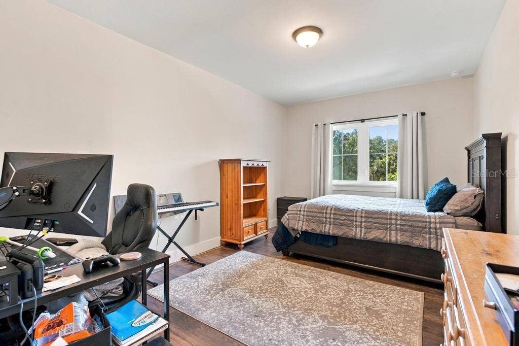 Spacious upstairs fourth bedroom with views