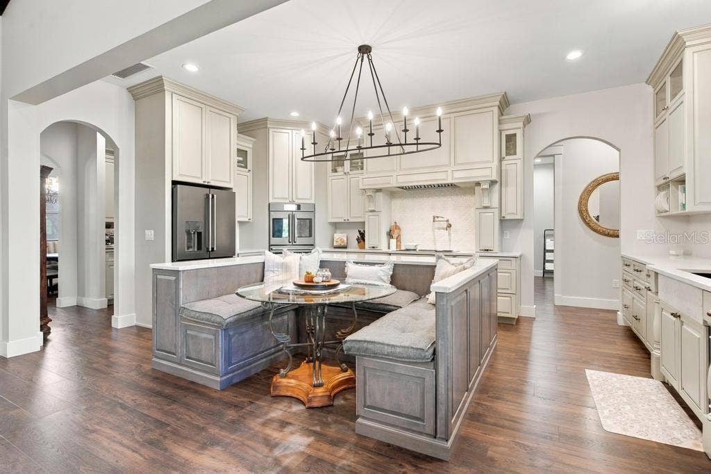 Kitchen features built in breakfast booth, with under seat storage!