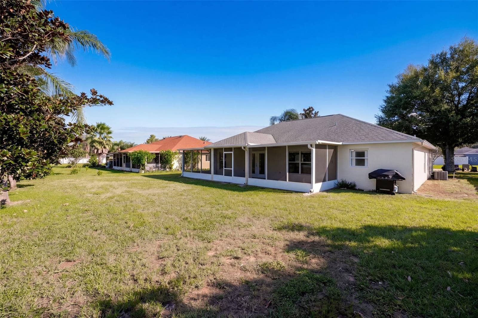 11413 PATRICO LOOP, Clermont, FL 34711 Back Exterior & Backyard
