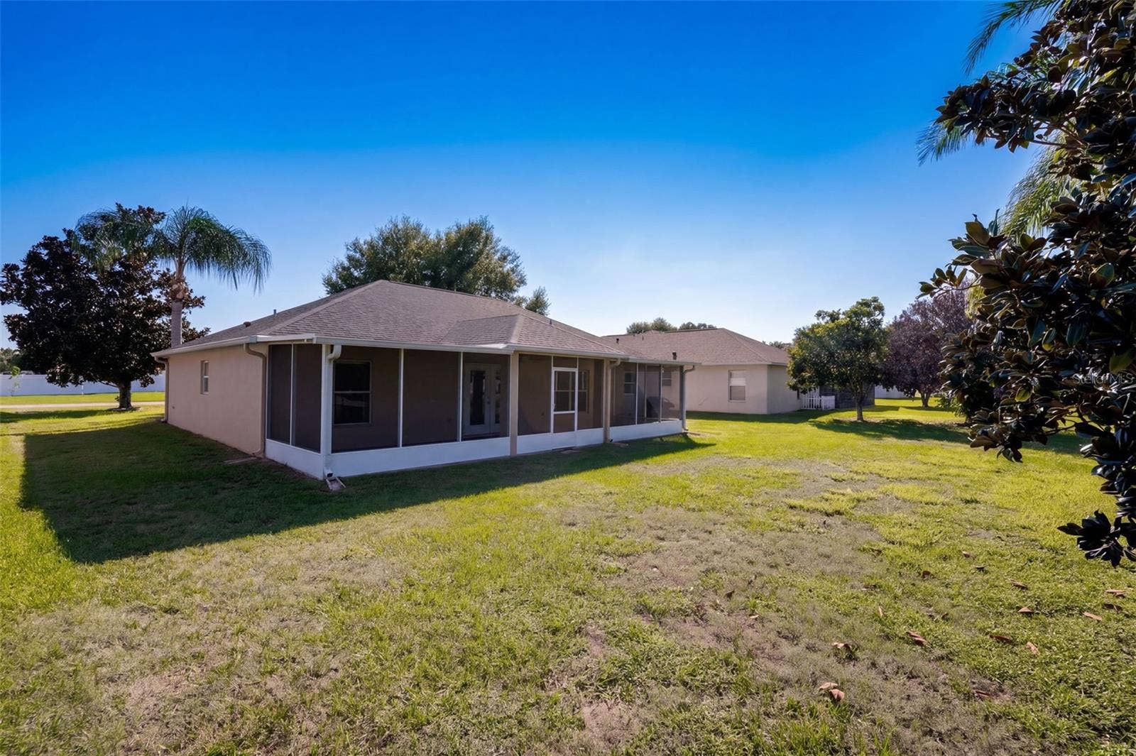 11413 PATRICO LOOP, Clermont, FL 34711 Back Exterior & Backyard