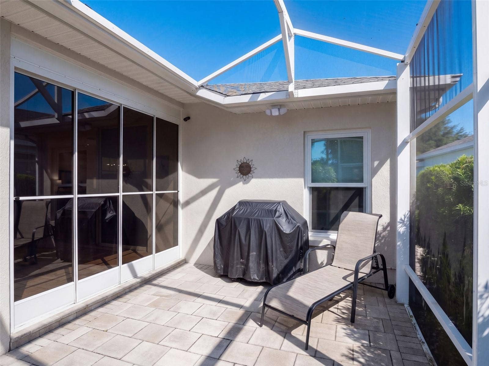 21411 ROYAL TROON DRIVE, Leesburg, FL 34748 Additionally, a screen lanai on the back of the house with gorgeous conservation views