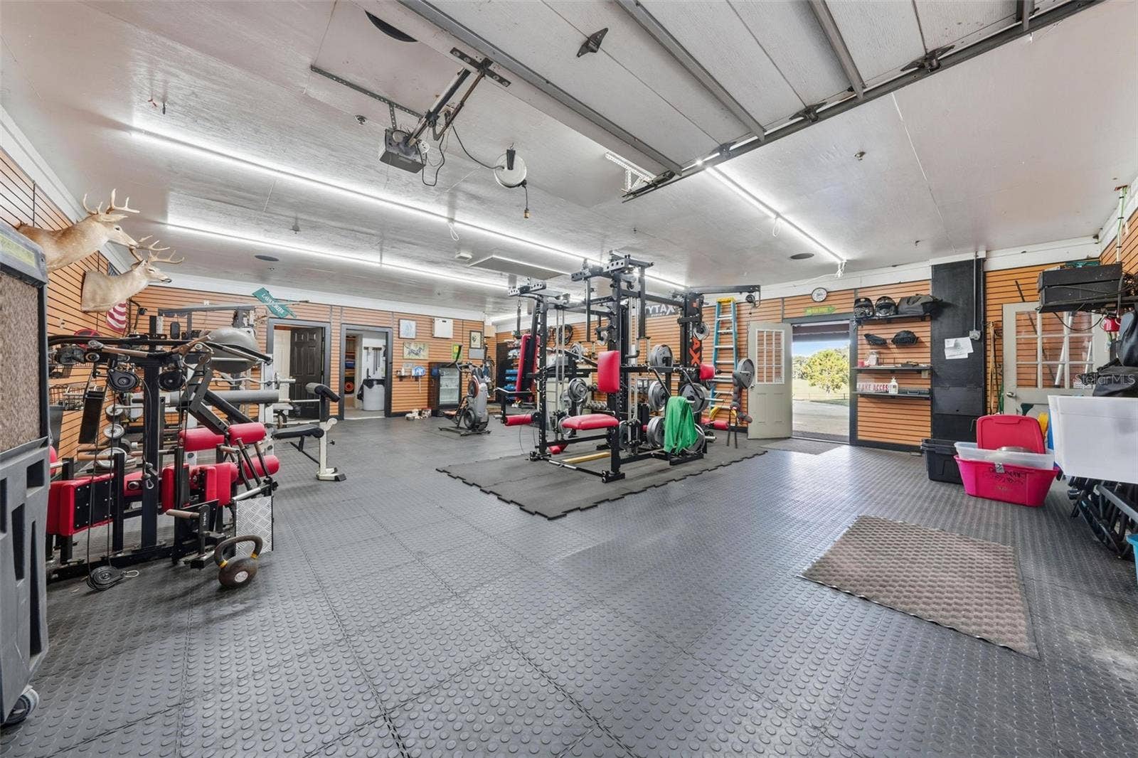 15211 VINOLA PLACE, Montverde, FL 34756 storage-parking-entertainment area
