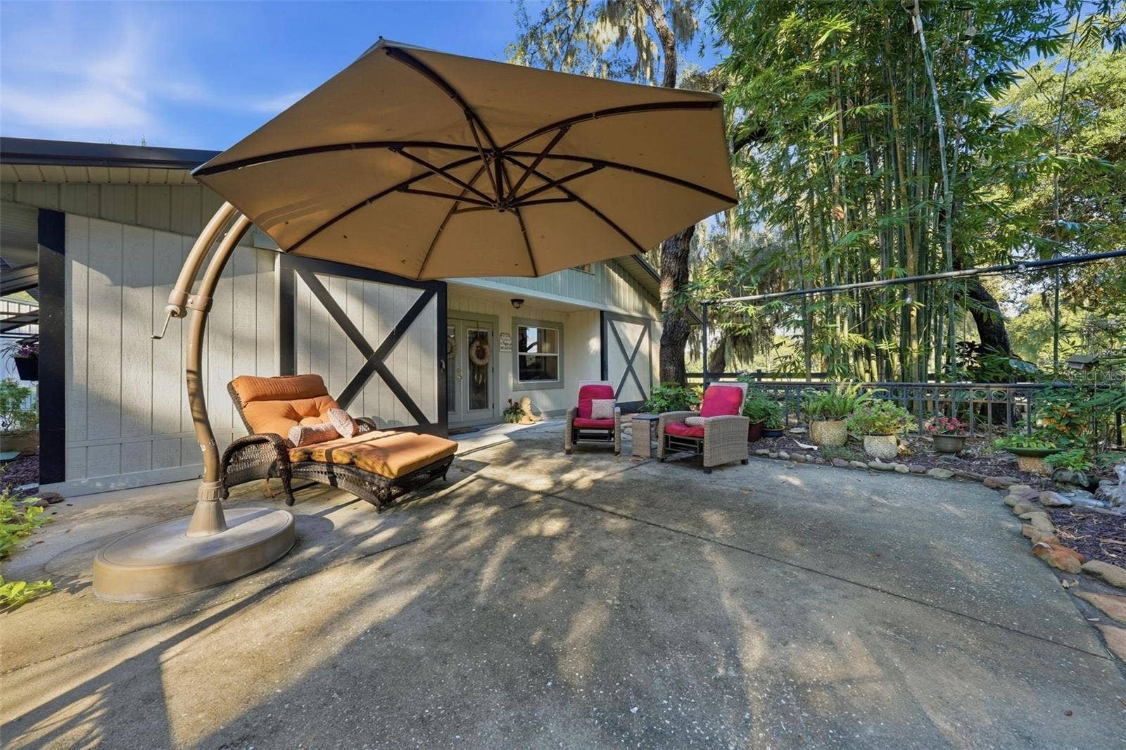 15211 VINOLA PLACE, Montverde, FL 34756 entry patio to Guest house