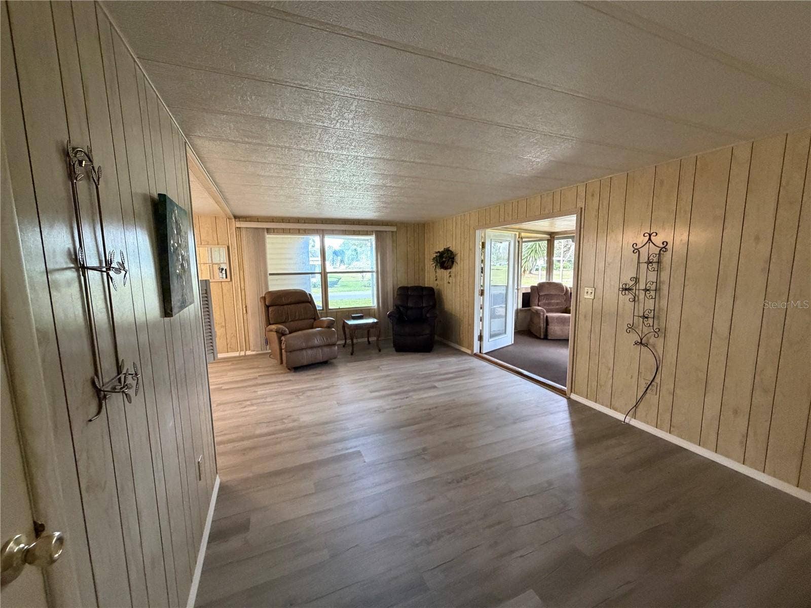 38 N BOBWHITE ROAD, Wildwood, FL 34785 Bedrooms to Living Room View 1