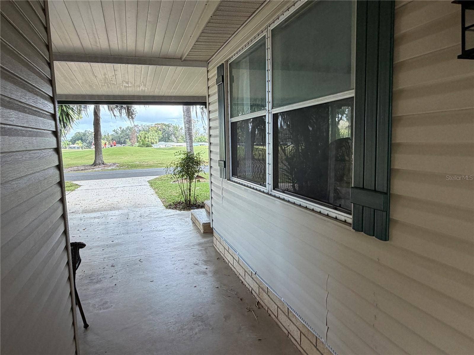 38 N BOBWHITE ROAD, Wildwood, FL 34785 5Ftx17Ft Breezeway Rear to Front View