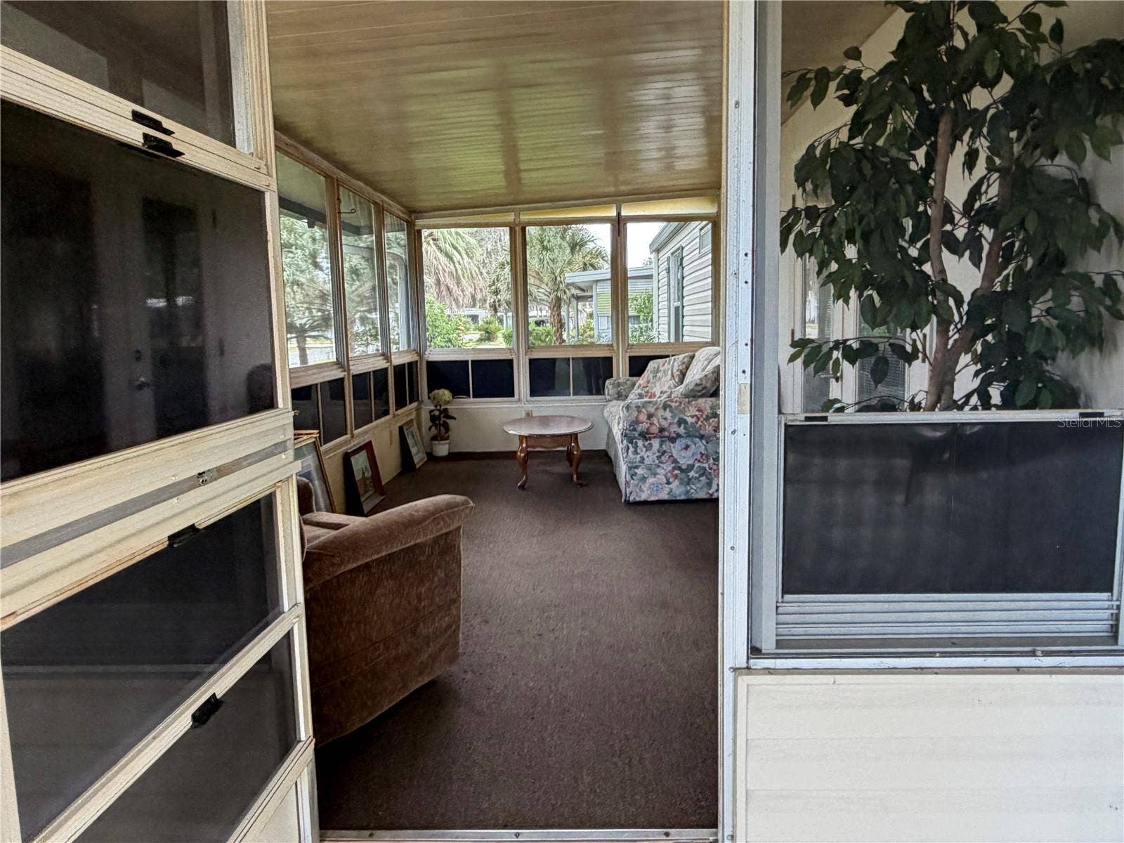 38 N BOBWHITE ROAD, Wildwood, FL 34785 Outside to Lanai Entrance View