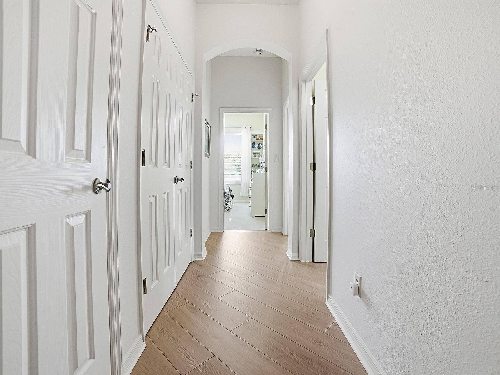 4818 SABLE RIDGE COURT, Leesburg, FL 34748 Hallway to the 2 Guest Rooms PLUS a double closet and Another Closet