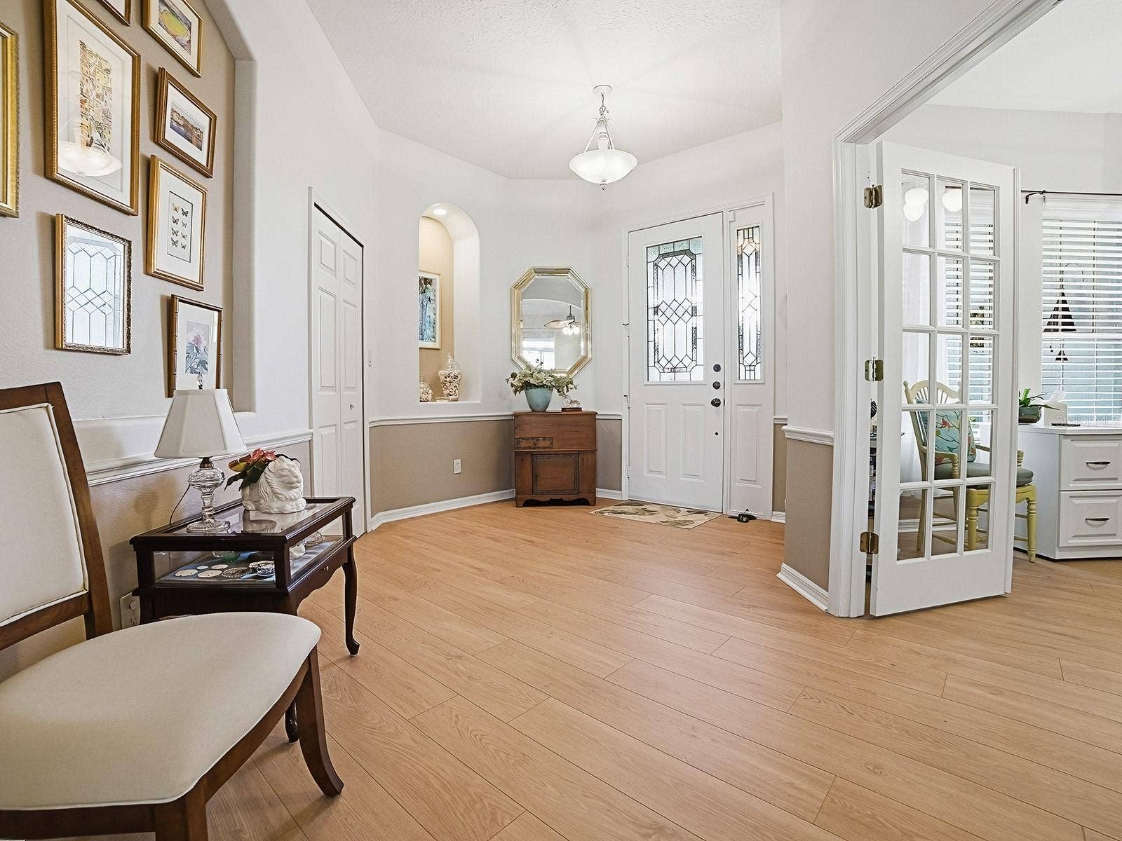 4818 SABLE RIDGE COURT, Leesburg, FL 34748 Spacious Foyer with a Hall Closet. This home has 8 closets and a walk in Pantry
