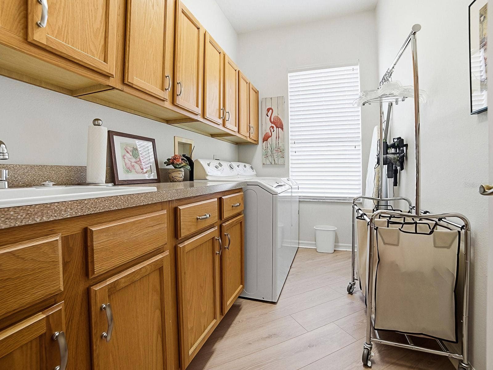 4818 SABLE RIDGE COURT, Leesburg, FL 34748 Laundry with storage