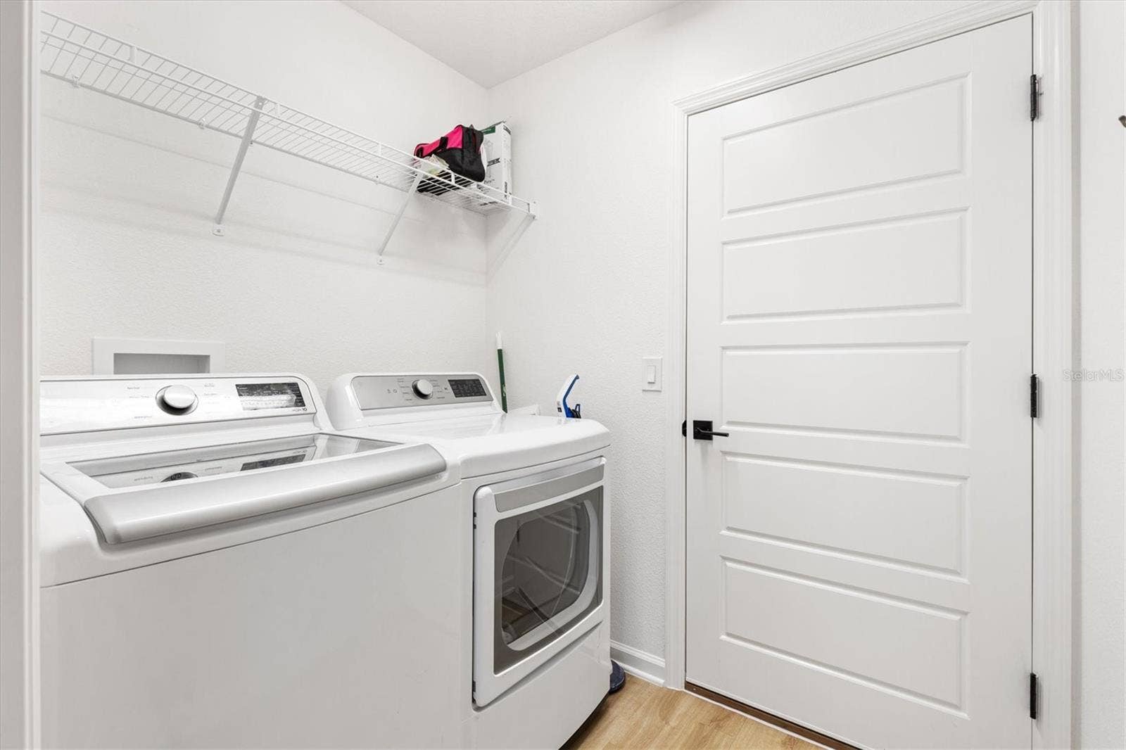 1613 MCLUCAS LANE, The Villages, FL 34762 Interior Laundry