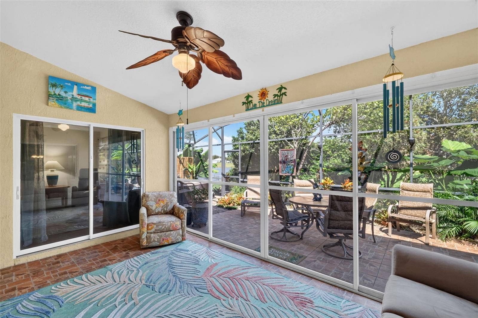 6121 HUNTERS RIDGE AVENUE, Leesburg, FL 34748 Enclosed Lanai