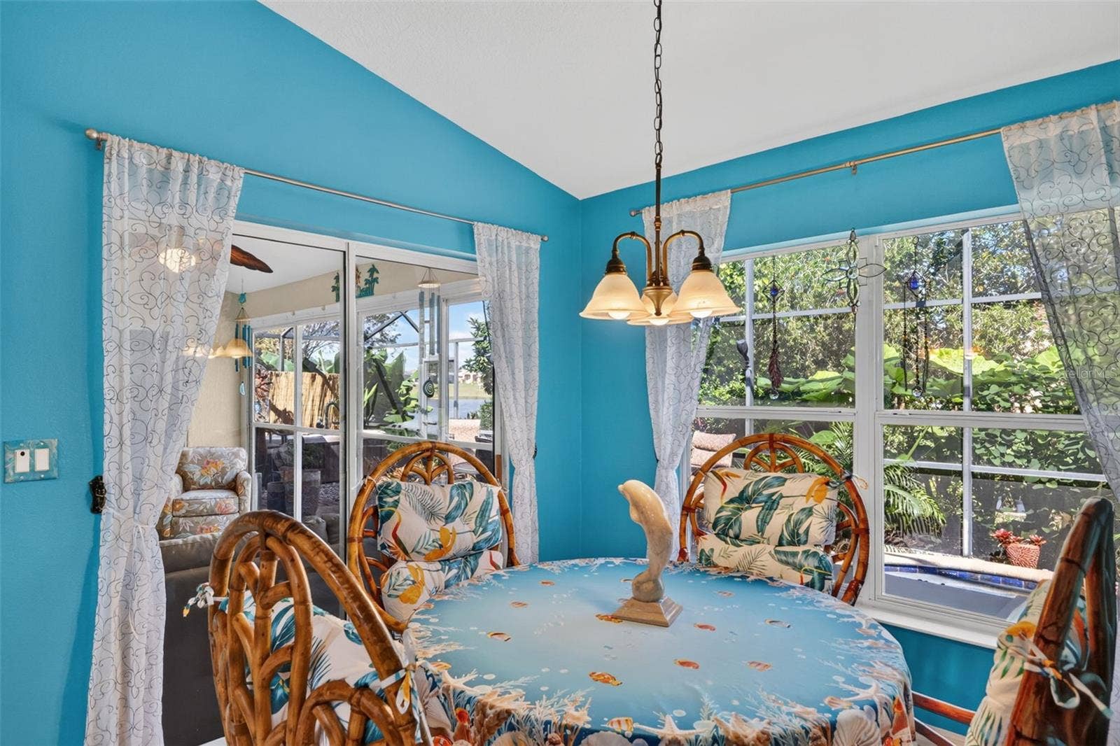 6121 HUNTERS RIDGE AVENUE, Leesburg, FL 34748 Gorgeous Pool and Tropical Landscaping Views from the Dinette!