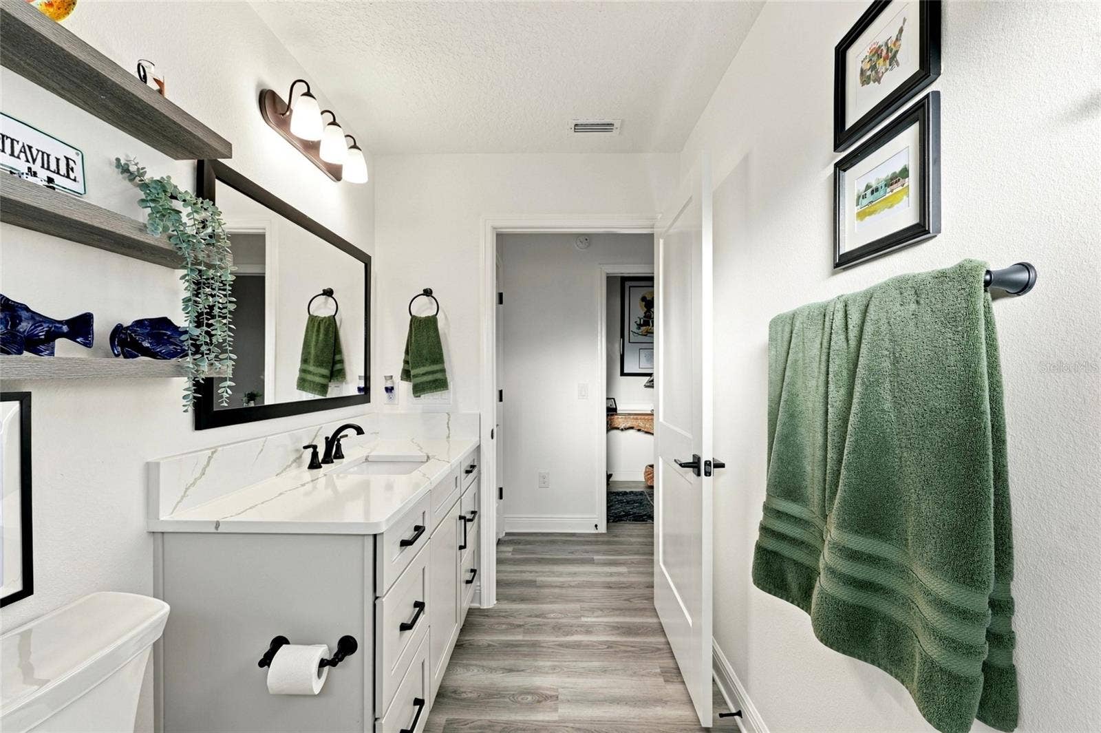 614 LAKE CREEK CIRCLE, The Villages, FL 34762 Guest Bathroom next to media room