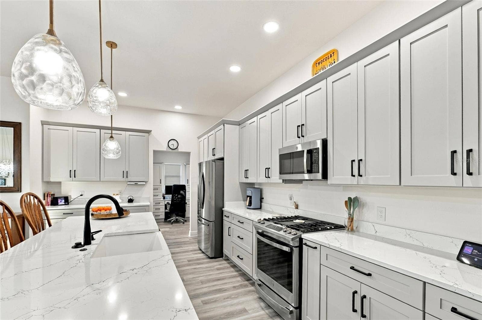 614 LAKE CREEK CIRCLE, The Villages, FL 34762 Kitchen toward Flex room (Office, Butler's Pantry etc.)