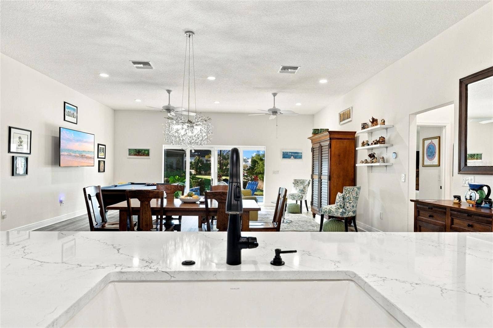 614 LAKE CREEK CIRCLE, The Villages, FL 34762 Main Living Area from Kitchen Sink